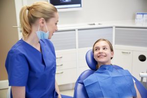 doctor and her patient smiling