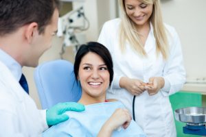 doctor nurse and patient smiling